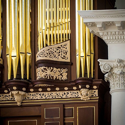 Carving and gilded pipes